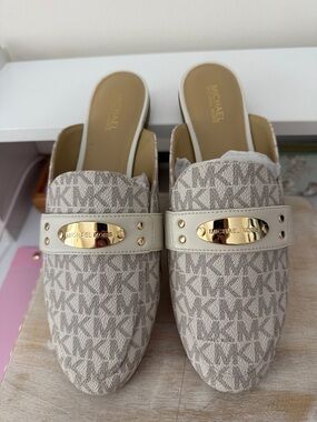 Michael Kors Beige MK Logo Slip-On Mules with Gold Plaque
